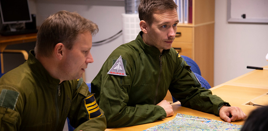 Two men and a map