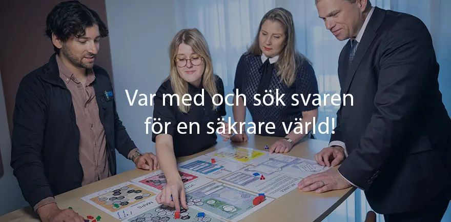 Personer som spelar spel vid ett bord
