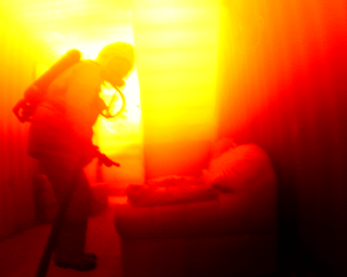firefighter in a smoke-filled training facility